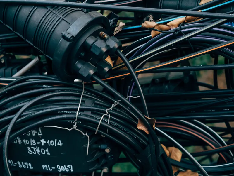 Black electrical wire bundle – holding and bundling tape application